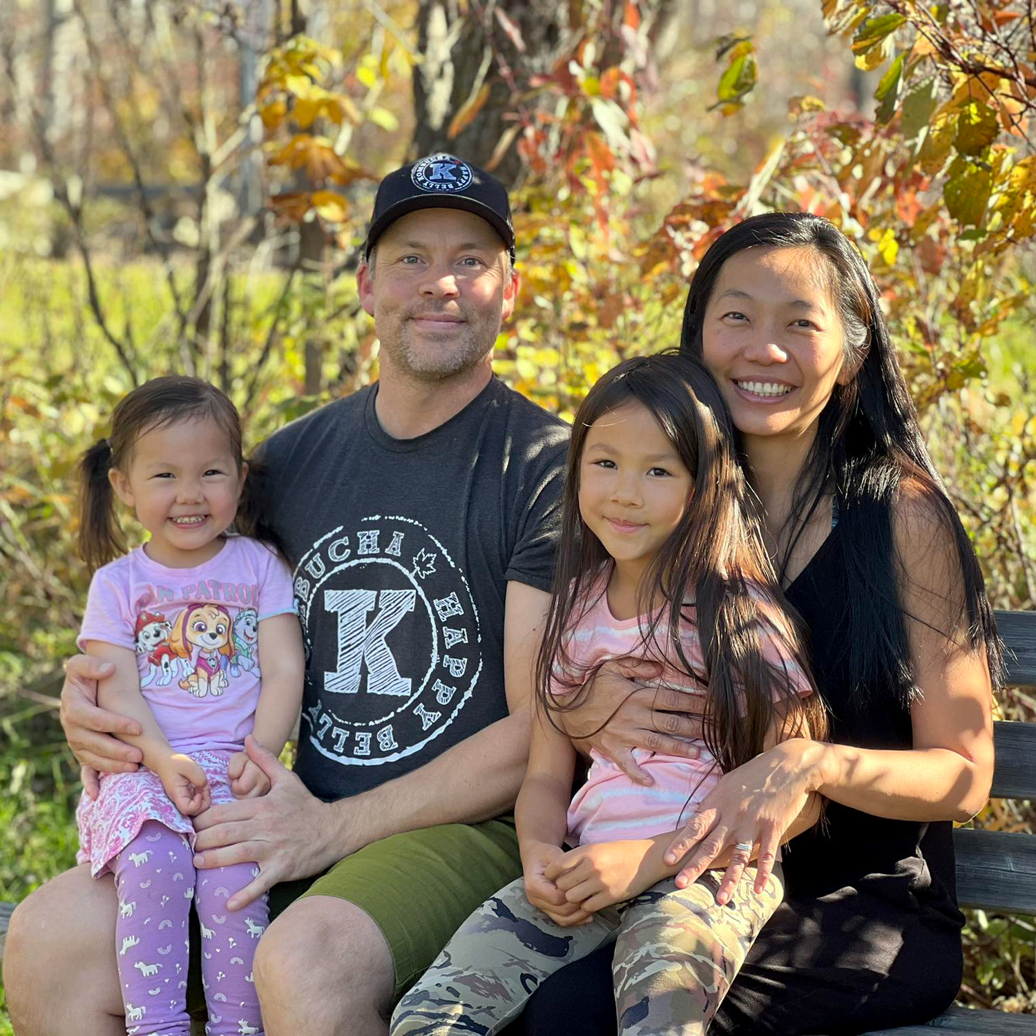 happy belly kombucha owners family with two daughters